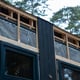 House Under Construction with Vertical Cladding and Ventilation System