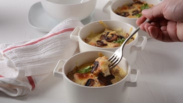 Julienne with chicken and mushrooms with a golden crust ,  baked cheese