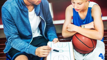 Young basketball player shoot