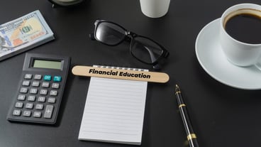 Business concept with a word Financial Education on black background
