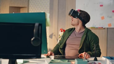Surprised creator trying vr headset at office close up man touching metaverse