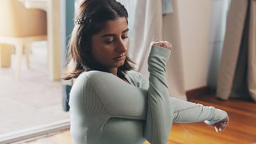 Yoga stretching and woman in morning for workout healthy body and mindfulness on house floor Pilates mental health and person in home for exercise mobility and wellness for calm in living room