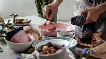 Midsection of man preparing food on table