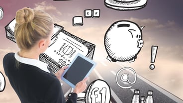 Composite image of blonde businesswoman holding a tablet