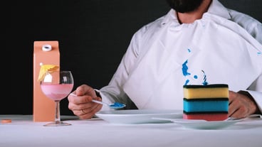Midsection of man with having food on table