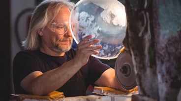 Glassblower working on a glass
