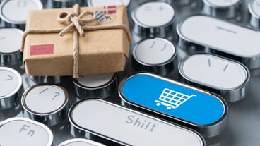 Online shopping and business icon on the retro computer keyboard