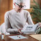 Senior woman taking a DNA test sent to her home.