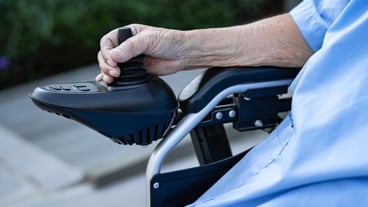 Asian senior woman patient on electric wheelchair with remote control at hospital healthy strong medical concept