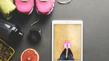 Training supplies near tablet with picture