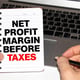 Business Term Business Phrase on Tablet PC with a cup of coffee Pens Calculator and yellow note pad