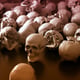 3d rendering Many skulls on the ground