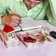 The concept of family budget planning, dividing income for the purchase of a house, car and travel