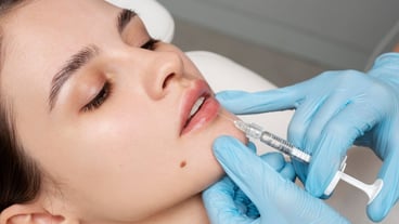 Close up woman getting lip fillers