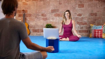 Girl doing yoga classes online