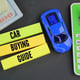 Cars calculators paper money and colored paper with the word car buying guide