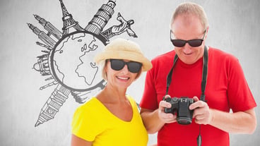 Happy mature couple with sunglasses on a white background