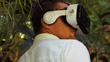 Portrait of a Man in VR 360, virtual reality 3D headset and exploring the game