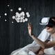 Woman with laptop enchanted by virtual reality. Mixed media