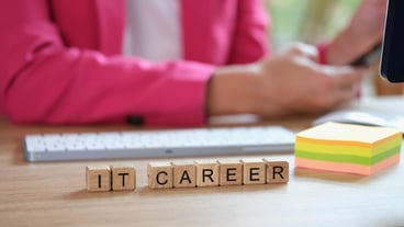Hiring it personnel for company concept hr manager at working desk and letters it career on