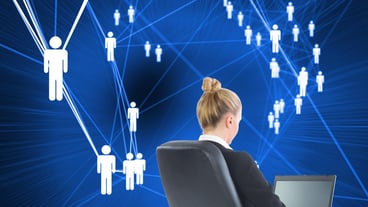 Composite image of blonde businesswoman sitting on swivel chair with laptop