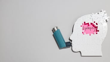 Epilepsy day concept human paper head with inhaler