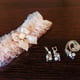 Square stone diamond jewelry on table