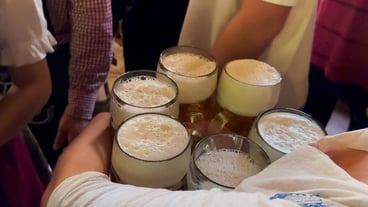 Waitresses carrying beer mugs at Oktoberfest Munich Germany September 21 2024