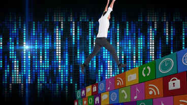 Cheering businessman in front of a digitally generated cool pixel background