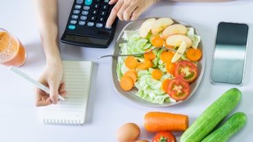Young Asian woman with healthy meals