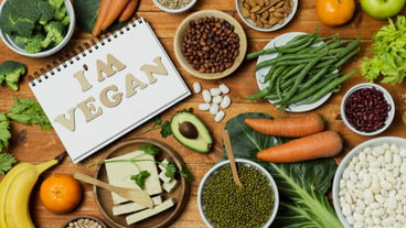 Above view arrangement with healthy food on wooden background