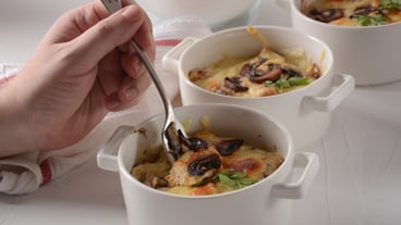 Julienne with chicken and mushrooms with a golden crust ,  baked cheese