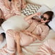 Cool Young Woman Lying on Bed