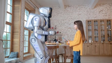 Robot and a cute girl spending time in the kitchen.