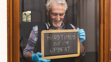 Portrait of a smiling man with text