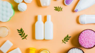 Spa cosmetics products on colored background