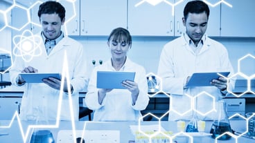 Science graphic against scientists using tablet pcs in the lab