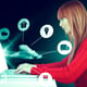 Composite image of smiling hipster woman using laptop