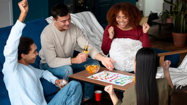 Friends having fun with traditional games