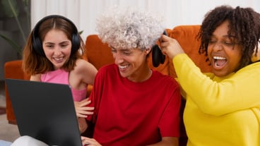 Medium shot friends playing videogame