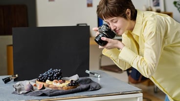 Photographer taking pictures of fresh fruits