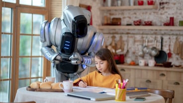 Robot teacher looking attentively how the girl writing