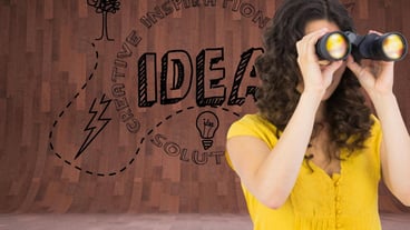 Composite image of casual young woman using binoculars
