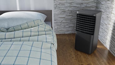 black mobile air conditioner in a room with a bed 3d