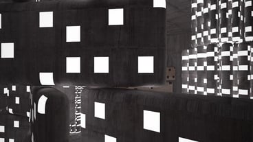 A black cubes with the word'chicano'on it