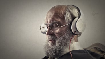 Old man listening to music