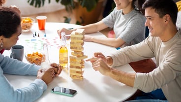 Friends having fun with traditional games