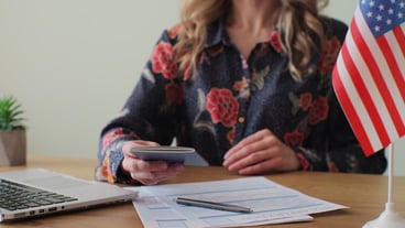 American woman consular officer giving passport to male immigrant work visa citizenship Visa Application online form immigration concept Visa approval