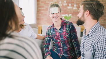 Excited friends enjoy guessing games