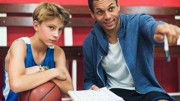 Young basketball player shoot